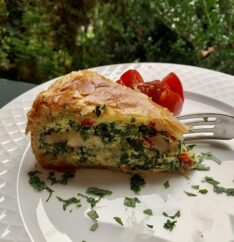 spinach ricotta puff on plate with fork